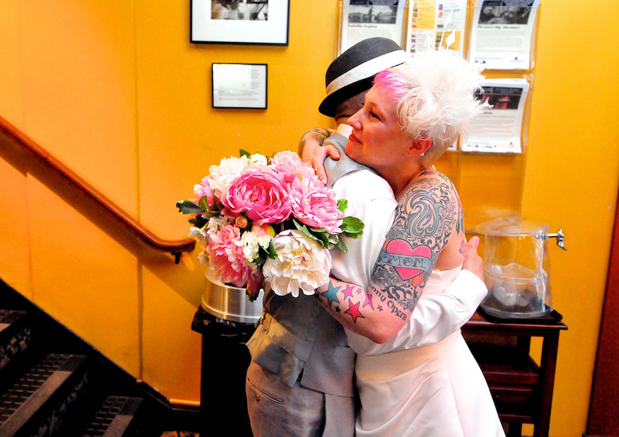 couple hugging at coolidge corner theater