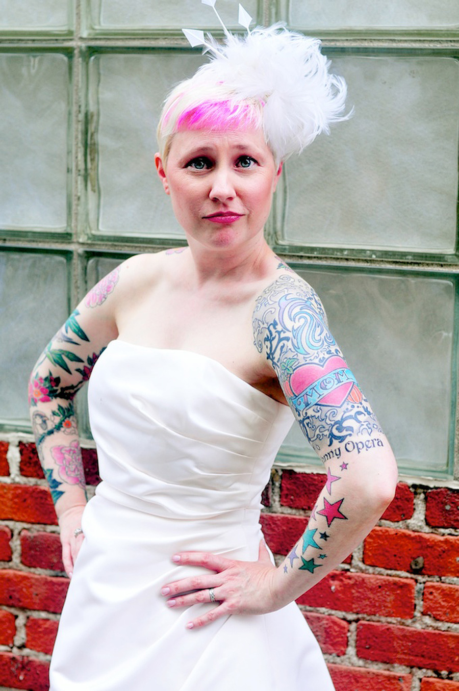 offbeat bride with tattoos and pink hair