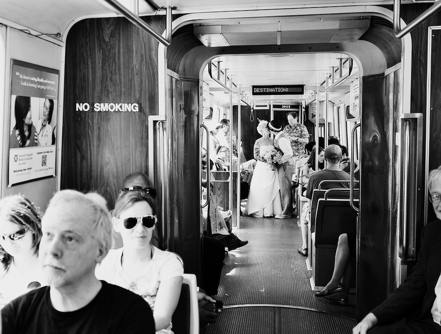 wedding couple kissing on the T