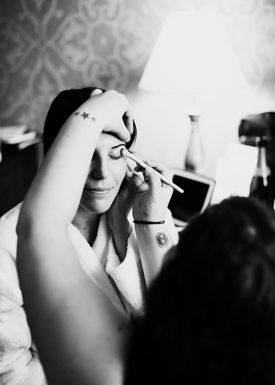 bride getting her makeup done