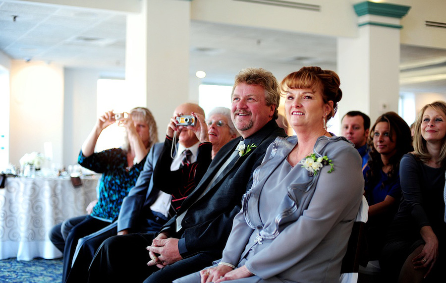 parents watching wedding ceremony