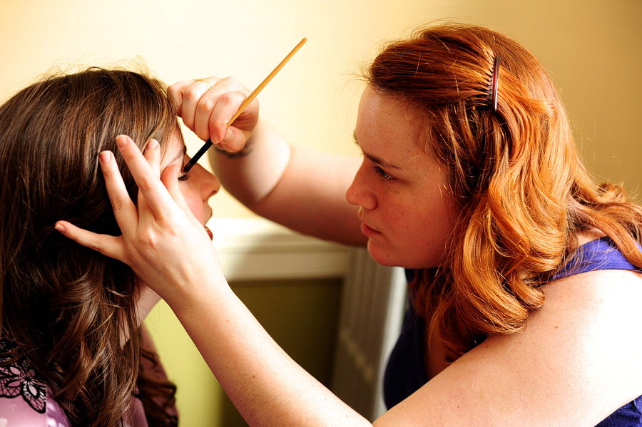 Tina glamming up a boudoir client!