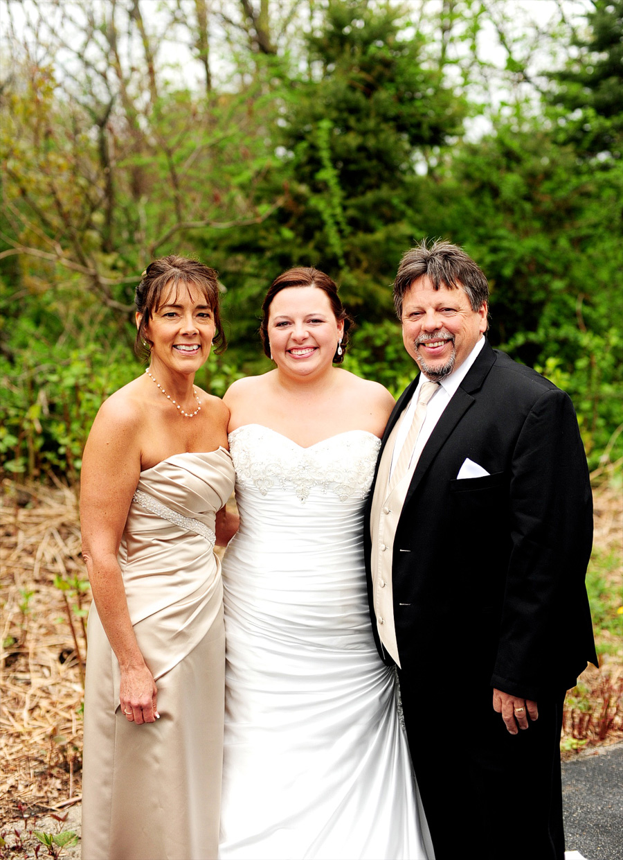 Jasmine with her dad & stepmom! We found a nice green spot for formals behind their church.
