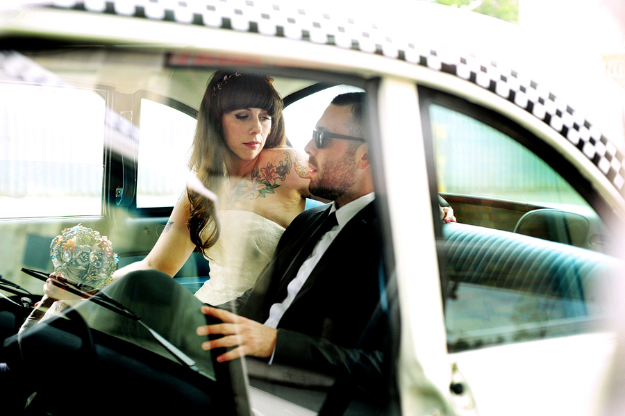 Justine & Scott in an old checkered cab. :)