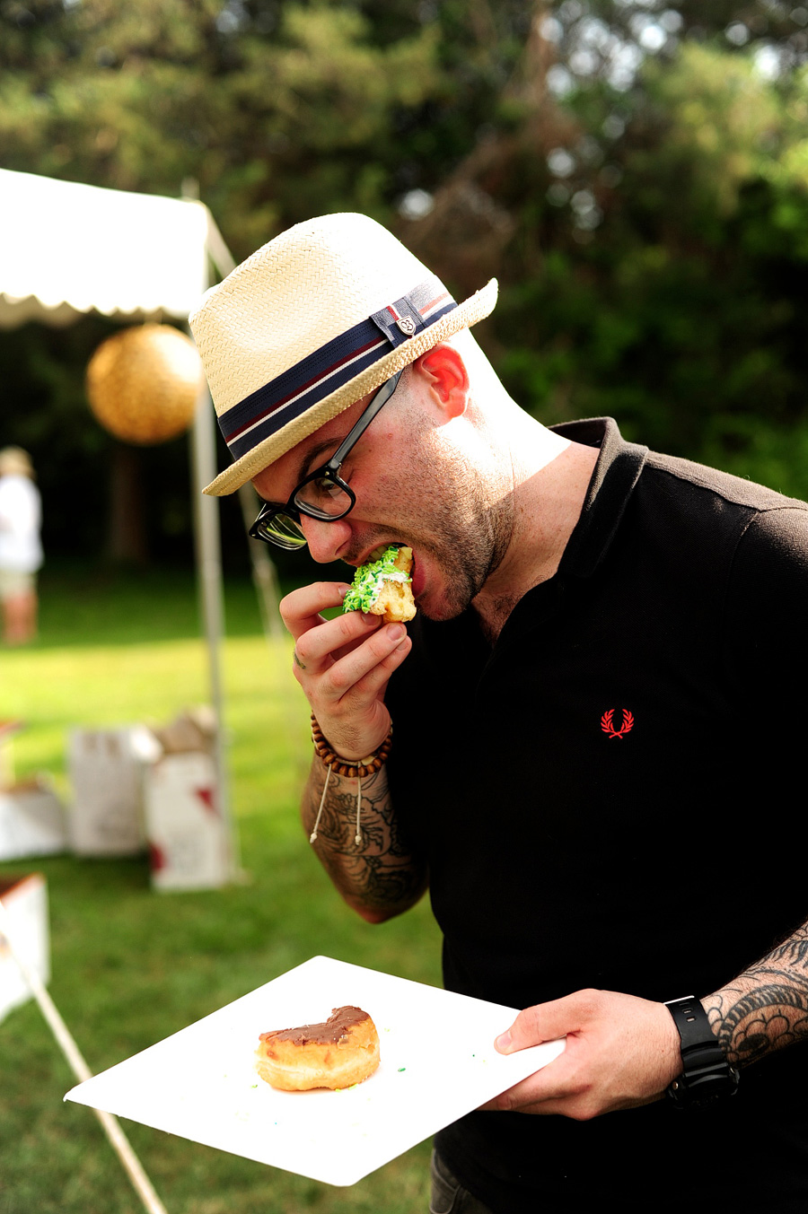 Graham enjoying the hell out of some donuts at Keeley & Matt's wedding!