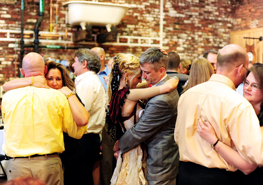 I love capturing the couple dancing in the middle of their friends and family. :)