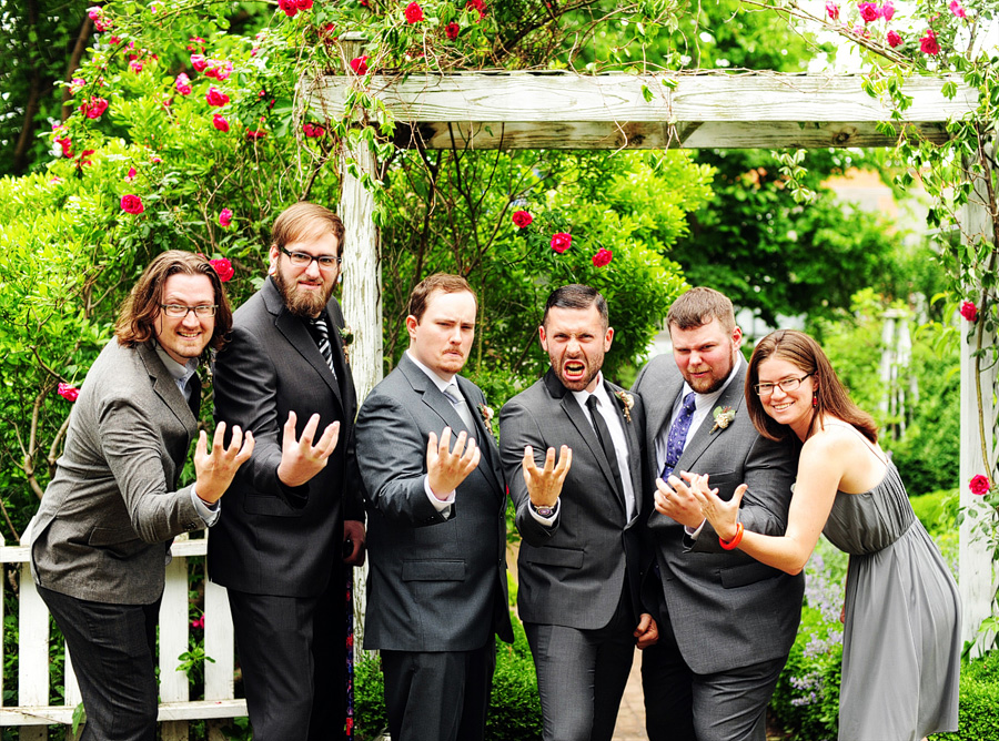 Scott and his wedding party doing "the metal claw". :D