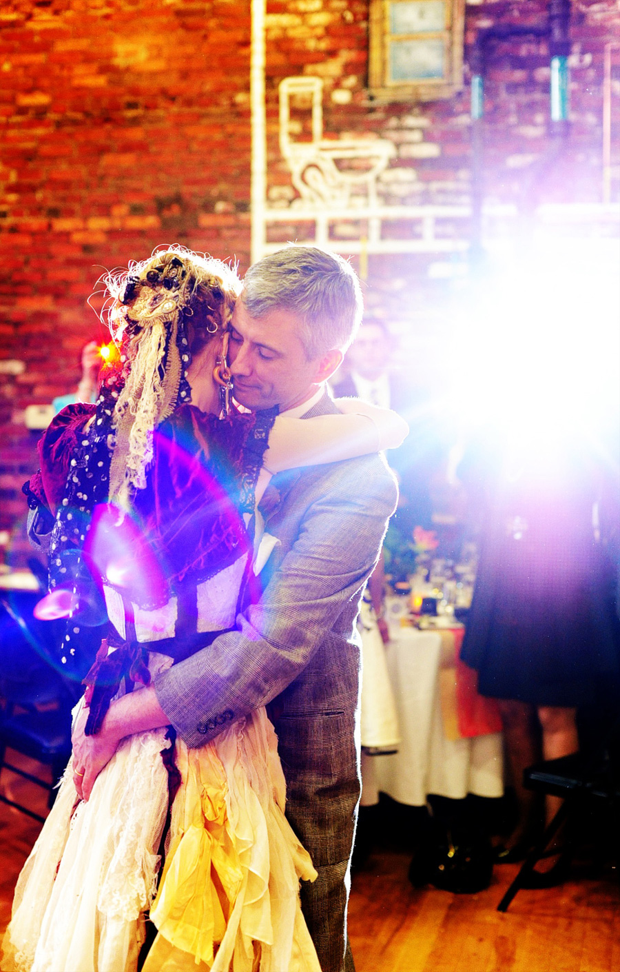 Tracy & Mike's first dance! Sometimes the flash from a guest's camera works in my favor. ;)