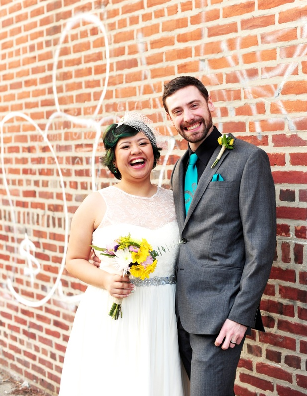 Abby opted for a birdcage veil, which perfectly complemented her short, sassy hair and casual style!
