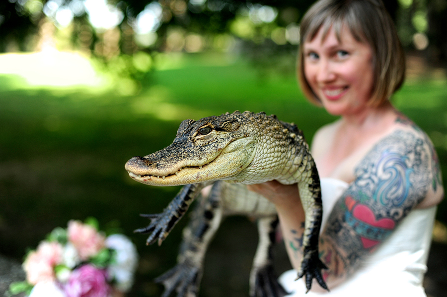 offbeat bridal session with a tattooed bride and an alligator