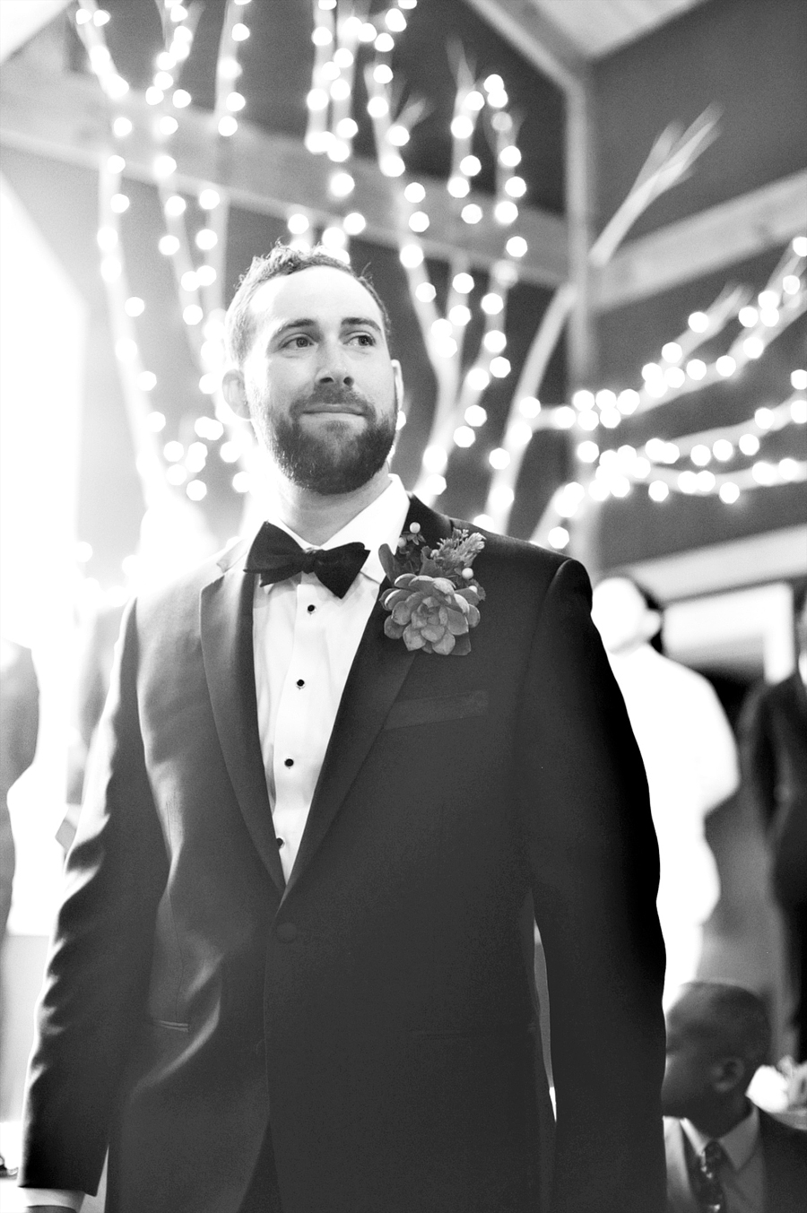 groom at the altar at the stone mountain arts center