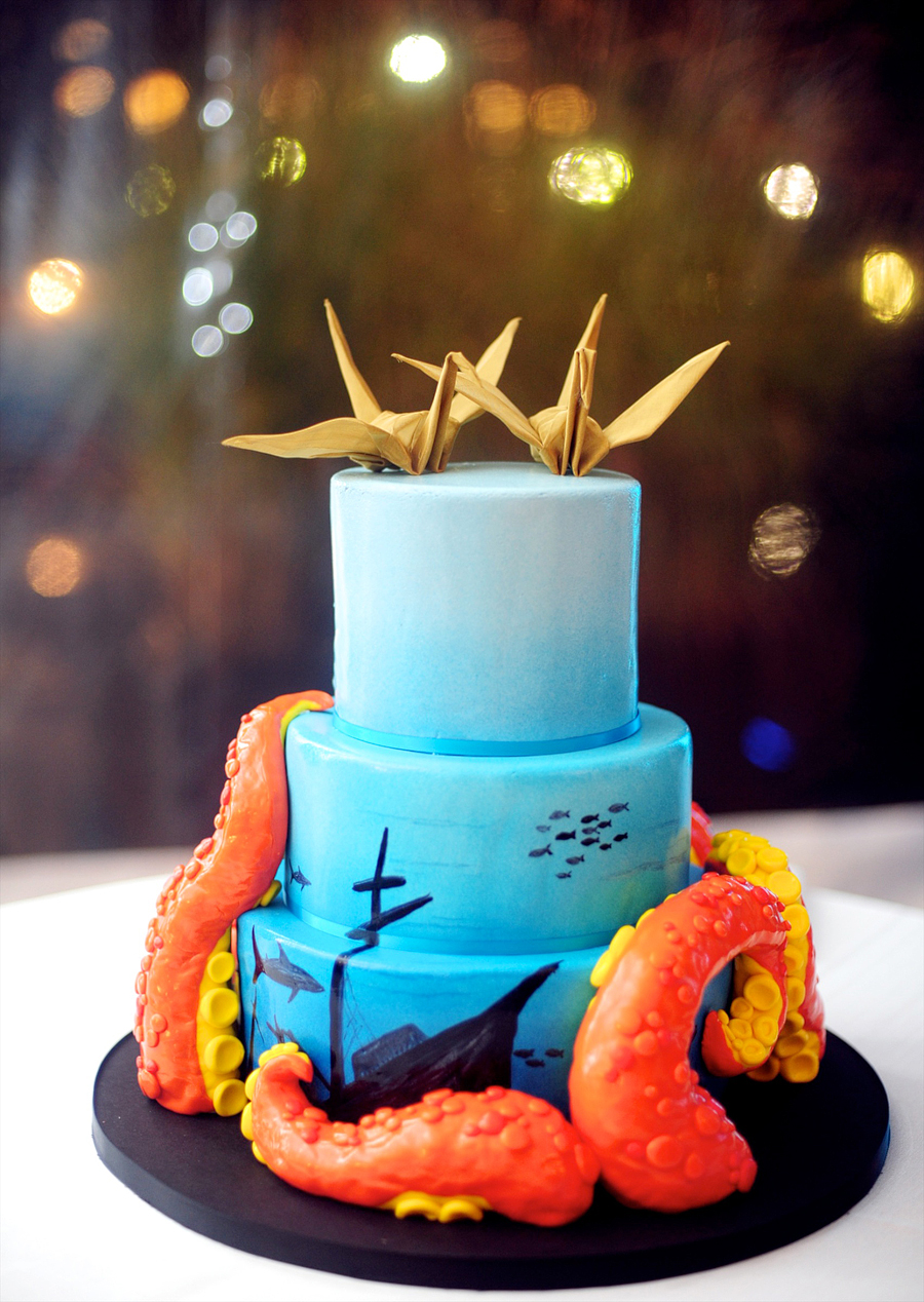 underwater themed wedding cake from sin custom cakes with an origami cake topper