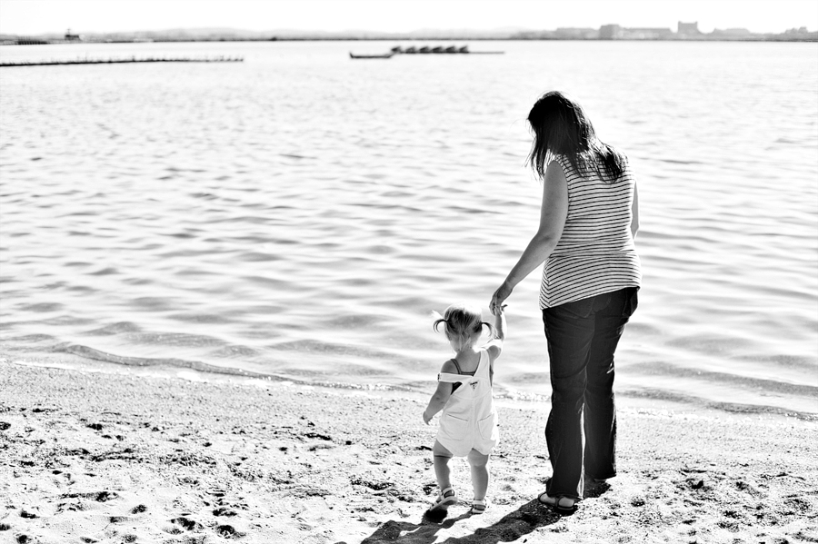 mother and daughter on the beach in boston