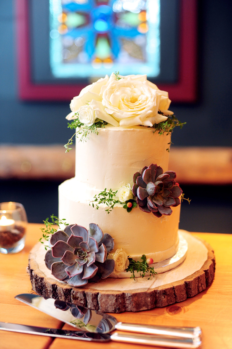 rustic three tier wedding cake with succulents