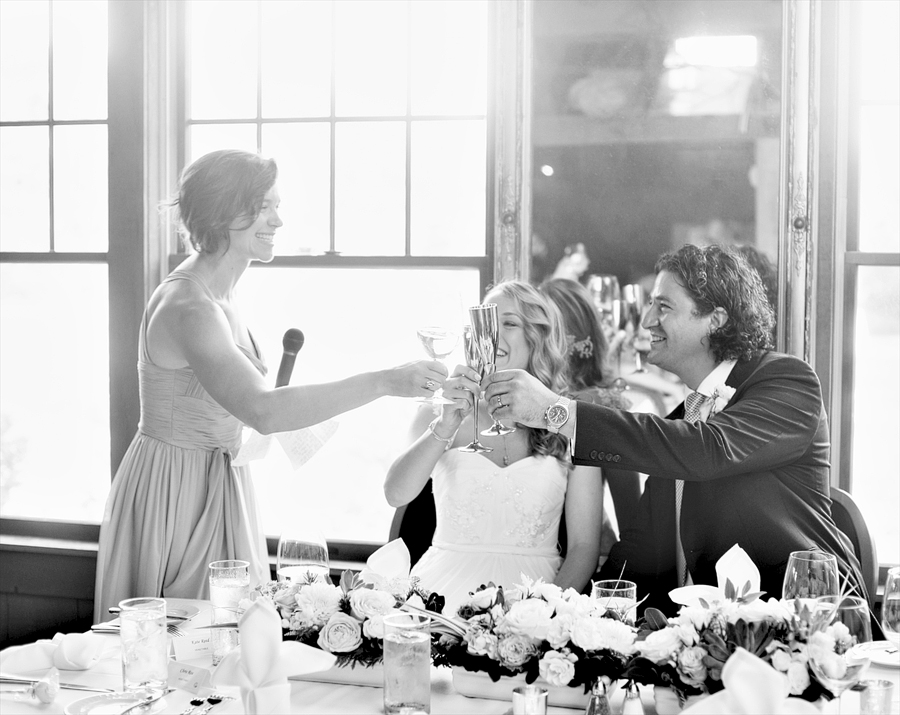 wedding toast candid photo at on the marsh bistro