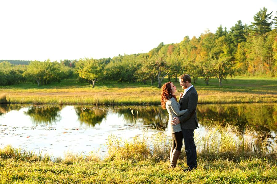 romantic engagement photos by a pond in maine