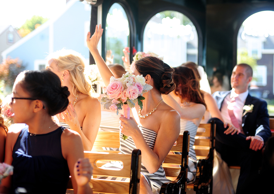 wedding party traveling by trolley 