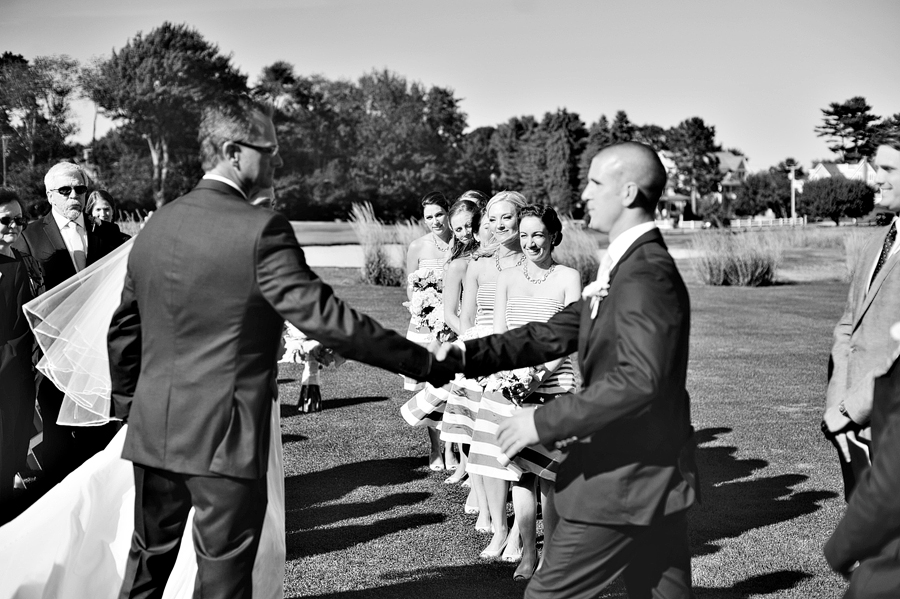 groom shaking the bride's father's hand