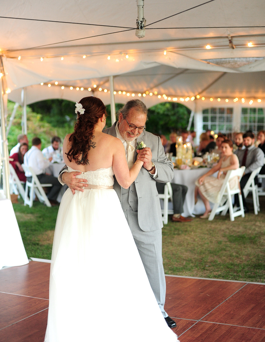 father daughter dance at tented reception
