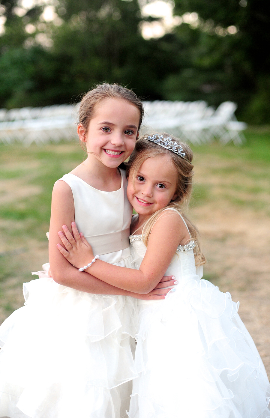 flower girls hugging