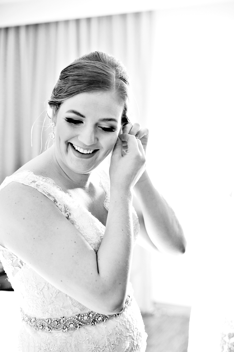 black and white photo of a bride getting ready at the westin portland harborview