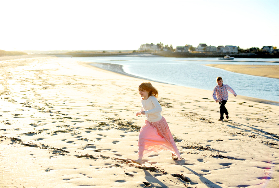 kids running on ferry beach