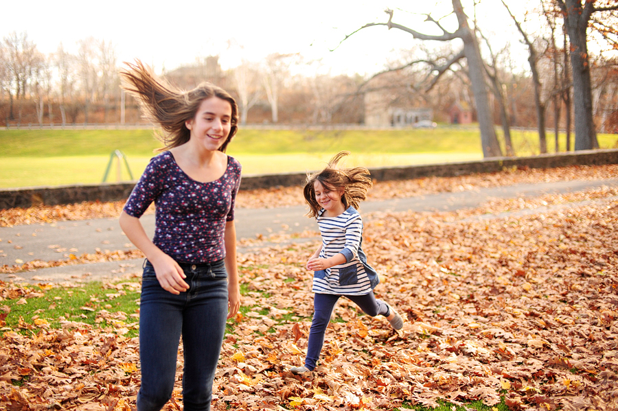 sisters chasing each other