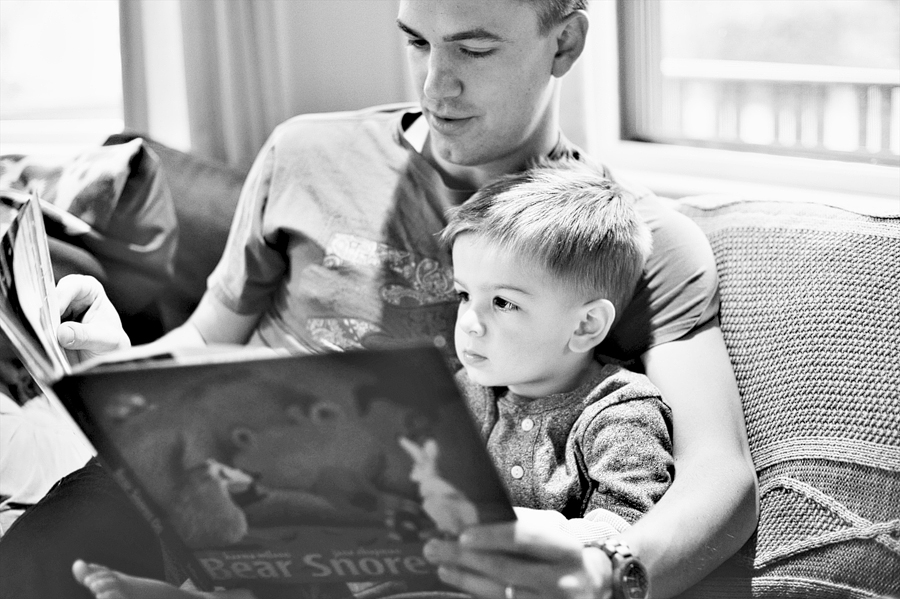 father reading to his son