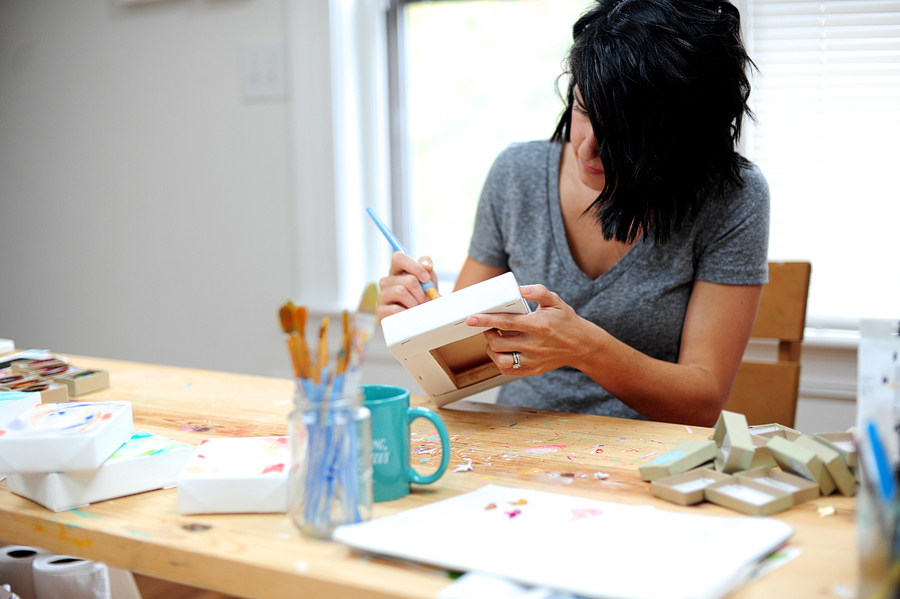an artist creating in her studio