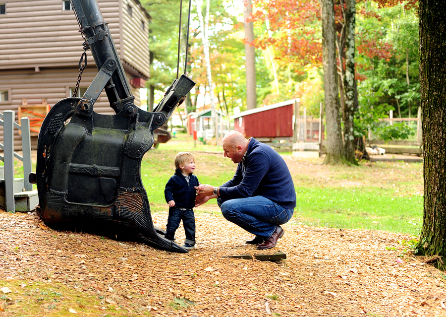 father and son playing at smiling hill farm