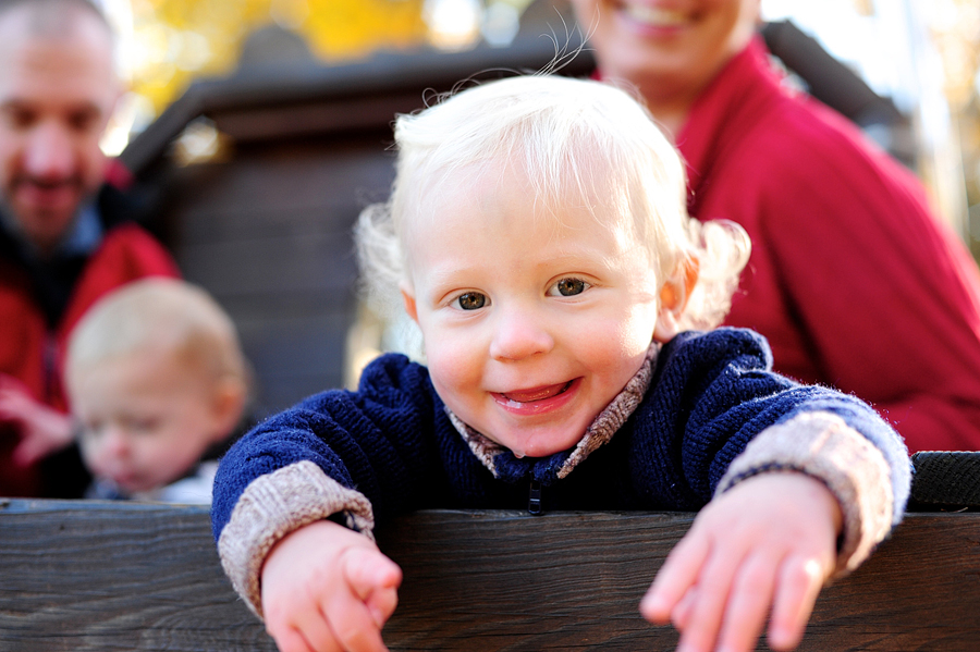 little boy smiling at the camera