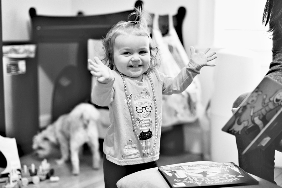 little girl happy to be reading