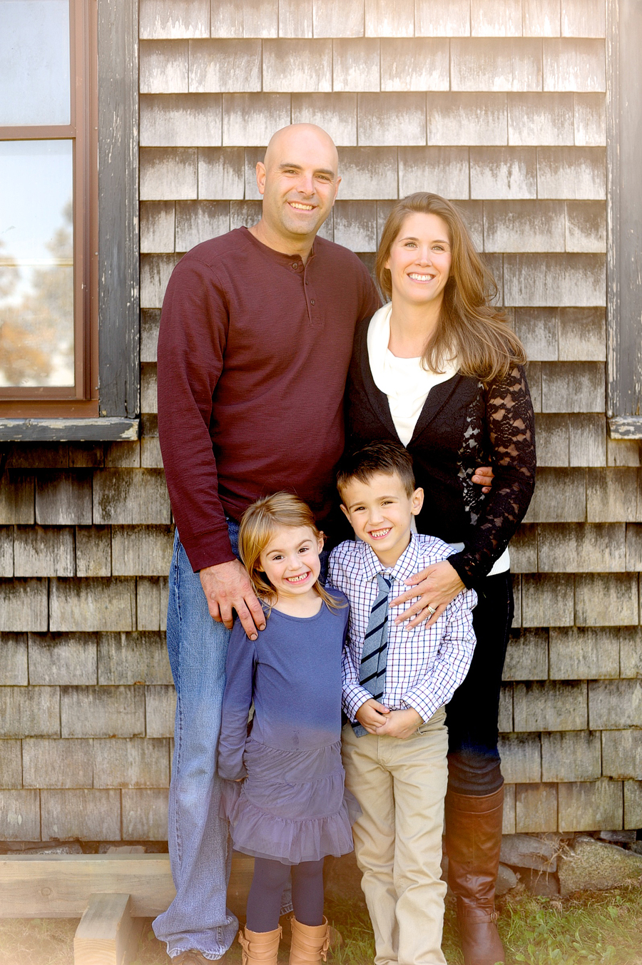 family photos against barn