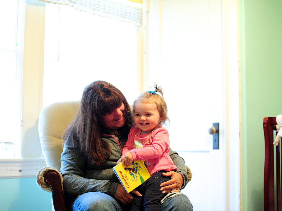 little girl in a rocking chair