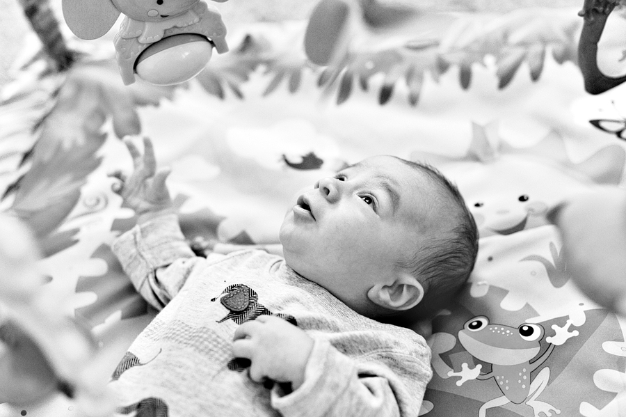 baby laying on pack-n-play