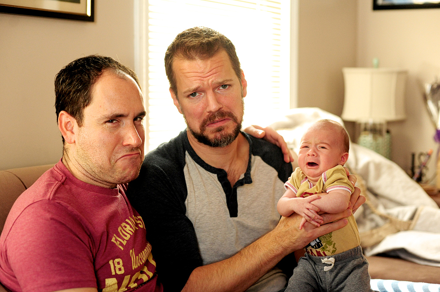 funny photos of two dads crying with baby