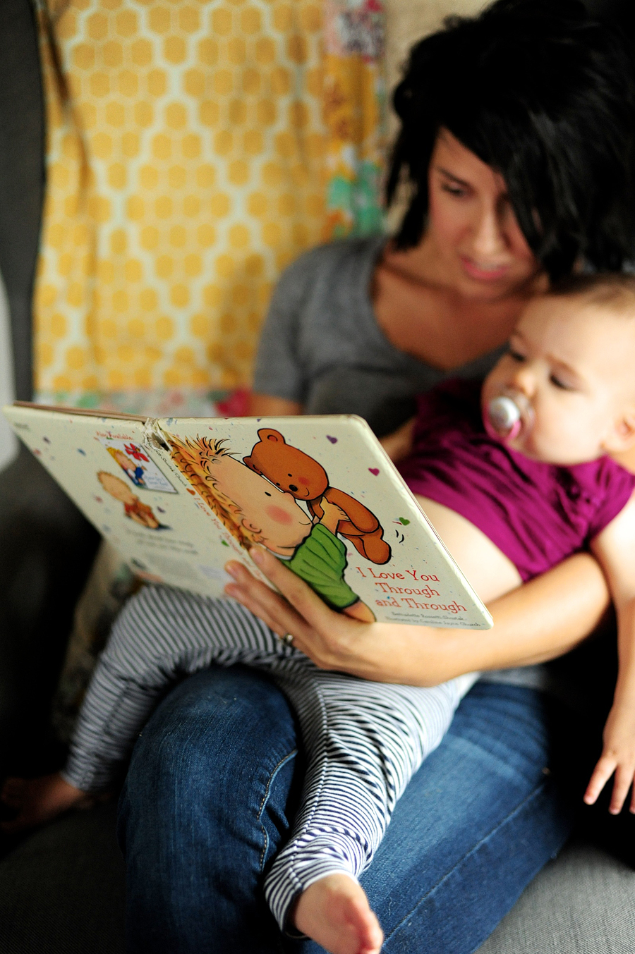 mother reading i love you through and through to daughter