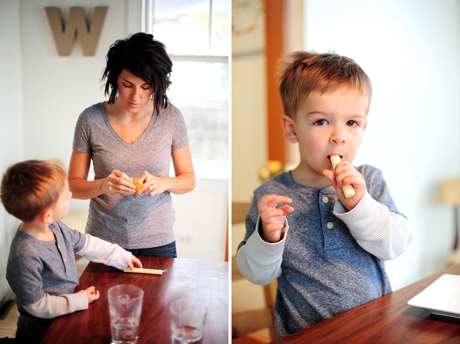 mother giving her son a snack