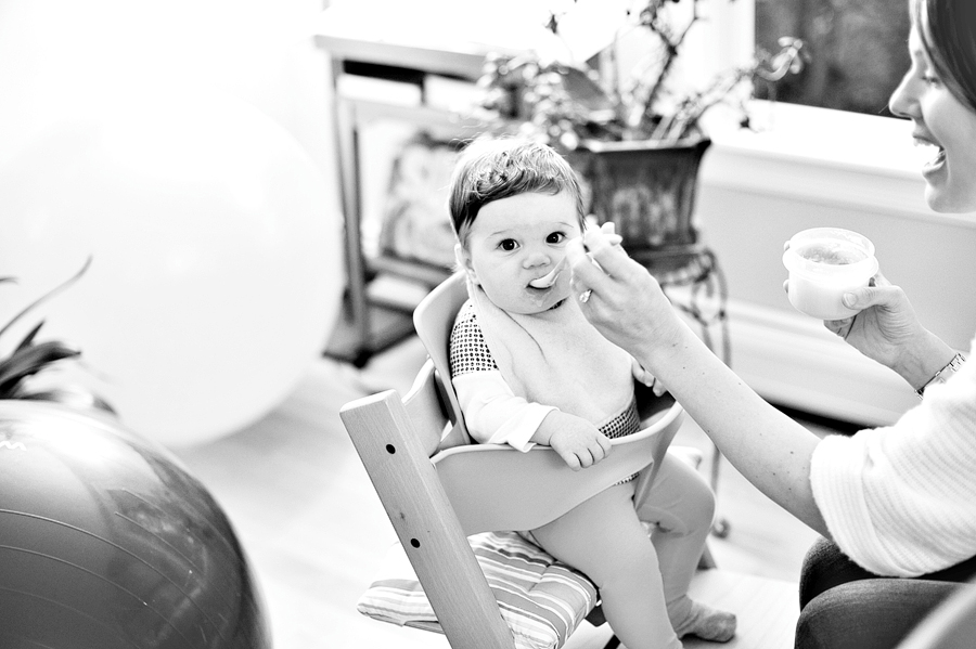 young child being fed