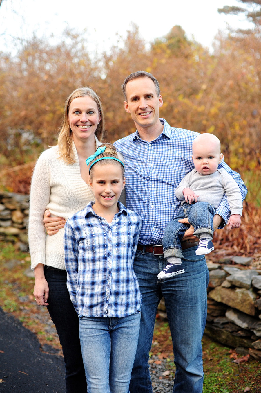 family smiling for camera