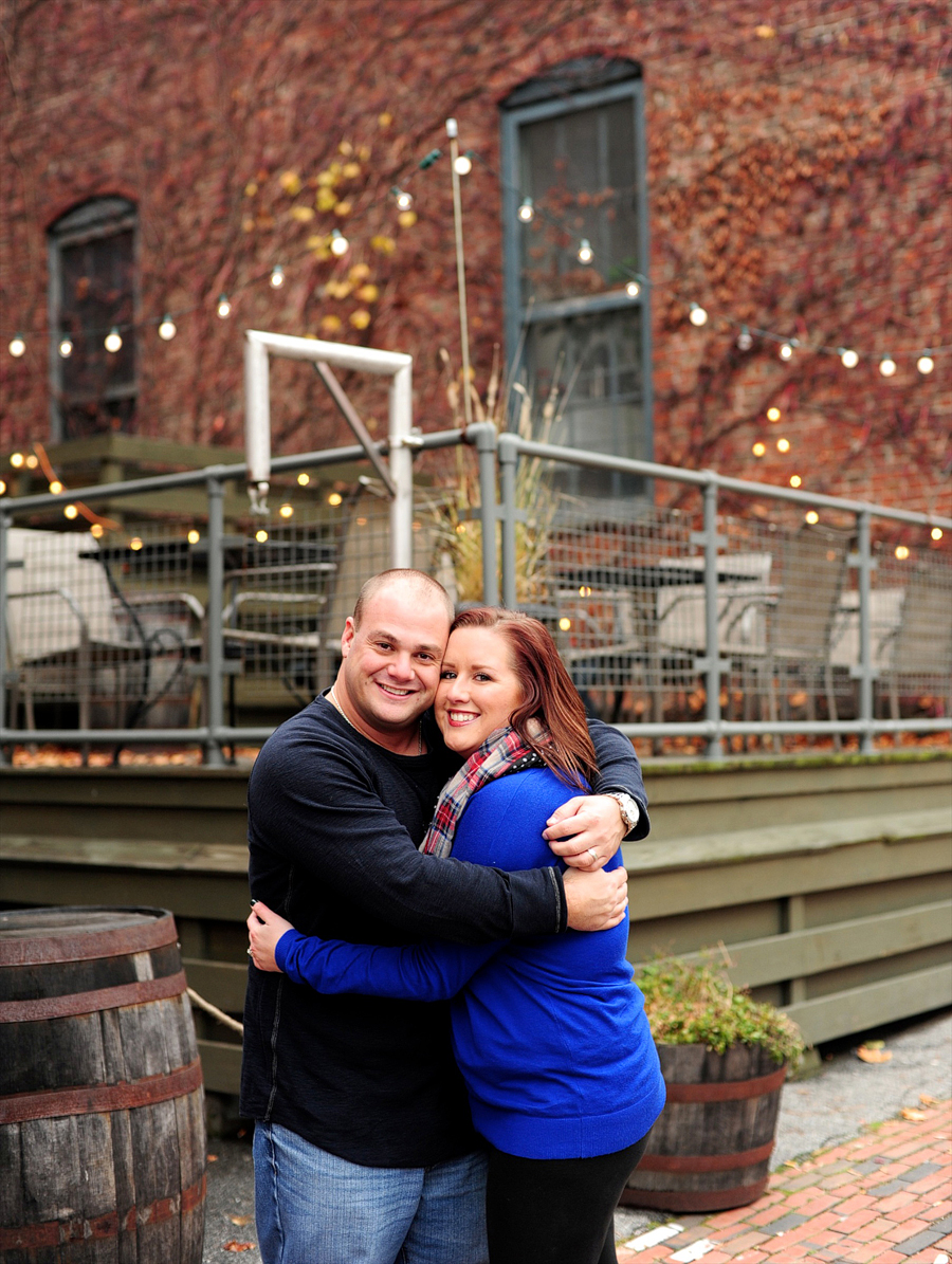 couple hugging with twinkling lights