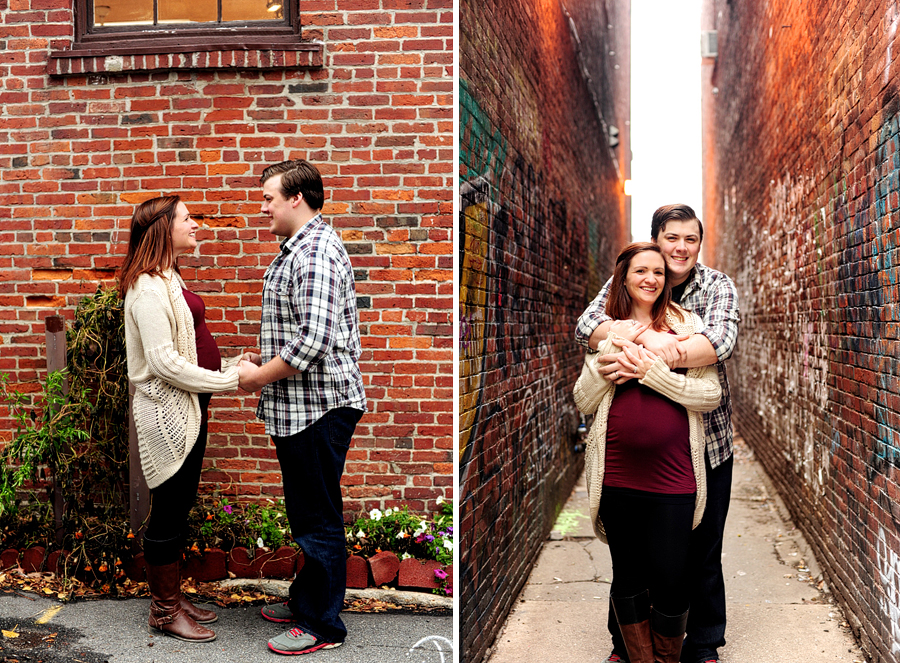 happy pregnant couple in old port