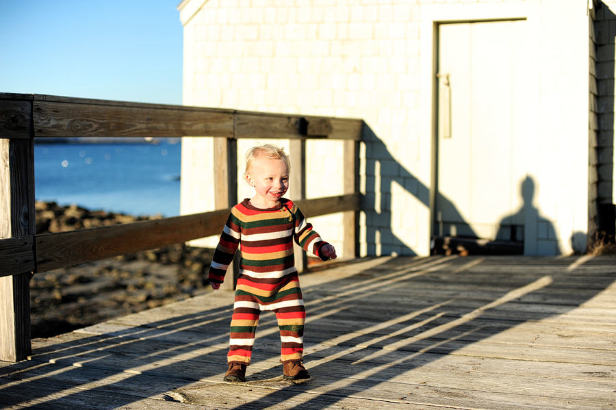 kid jumping and laughing