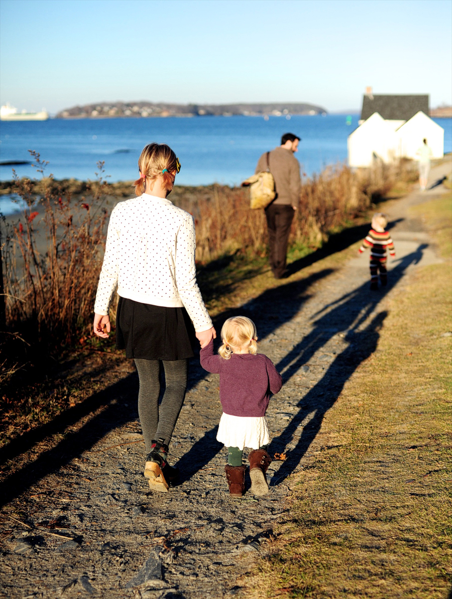 family walking hand-in-hand