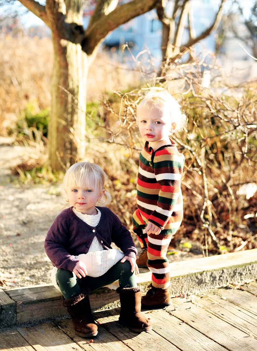 siblings posing during golden hour