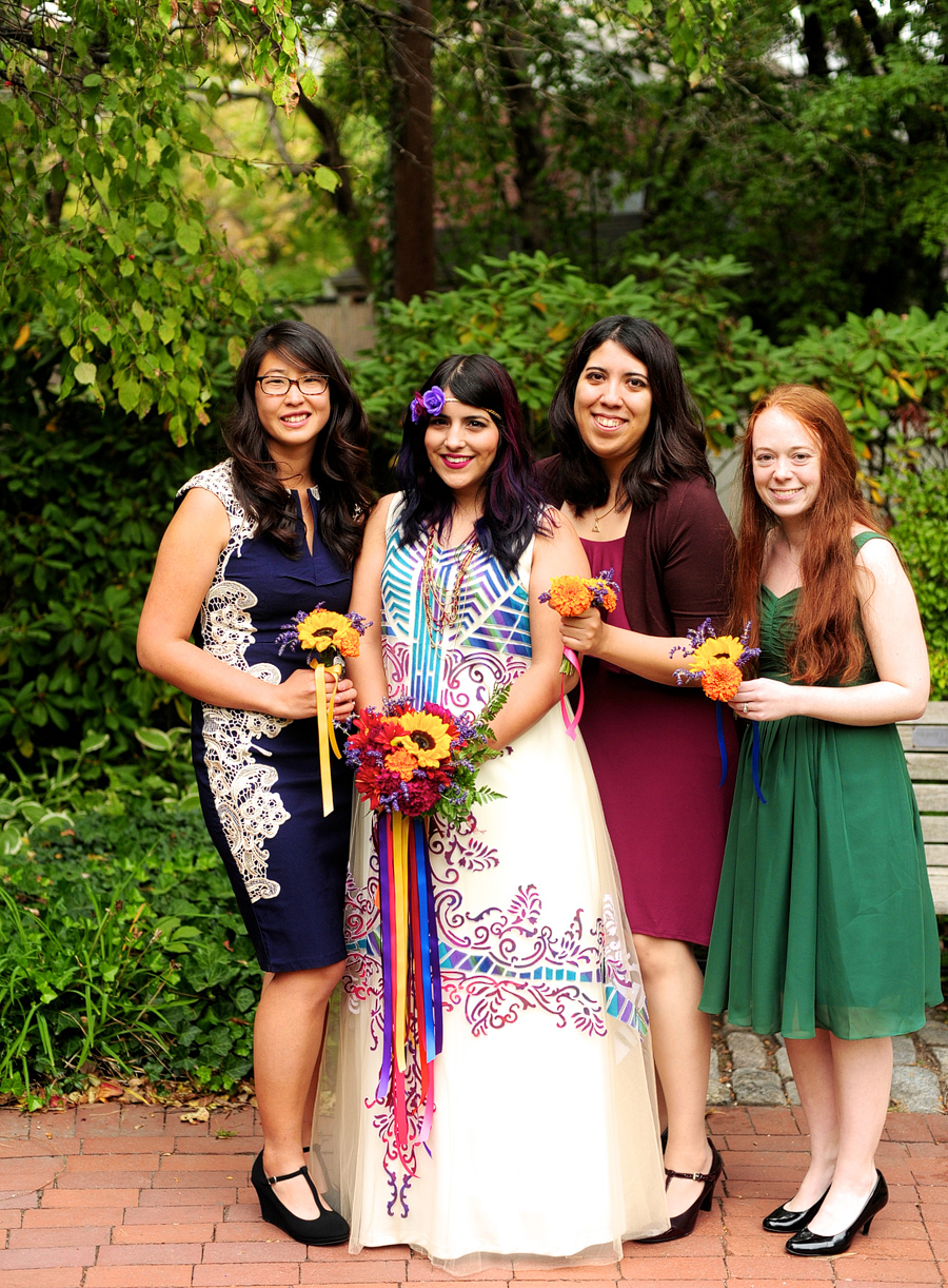 bride with bridesmaids in colorful dresses