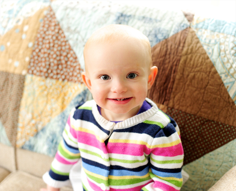 little girl in striped sweater