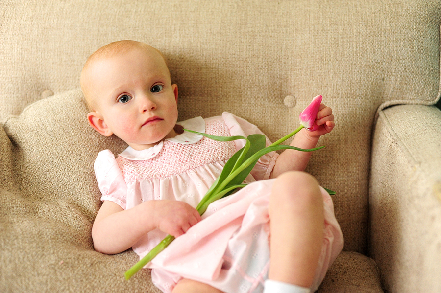 baby girl with tulip