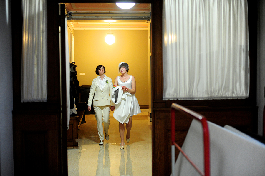 couple walking down hallway