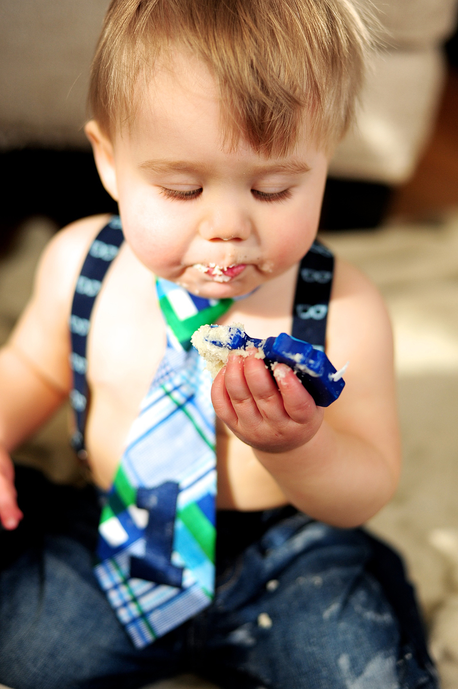 baby eating cake